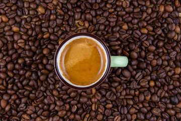 Espresso on coffee beans