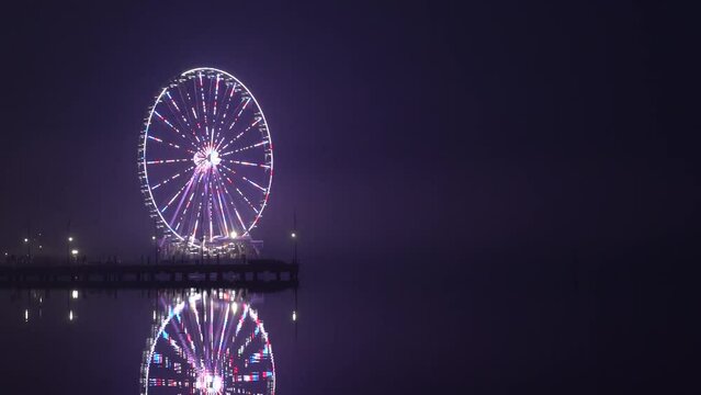 Washington DC USA The Capital Wheel in the Washington National Harbor at night. 