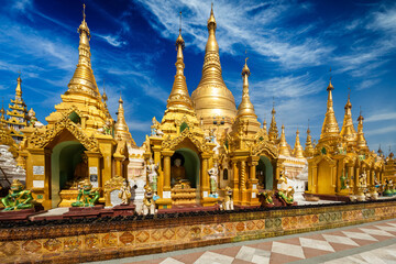 Myanmer famous sacred place and tourist attraction landmark - Shwedagon Paya pagoda. Yangon, Myanmar - Powered by Adobe