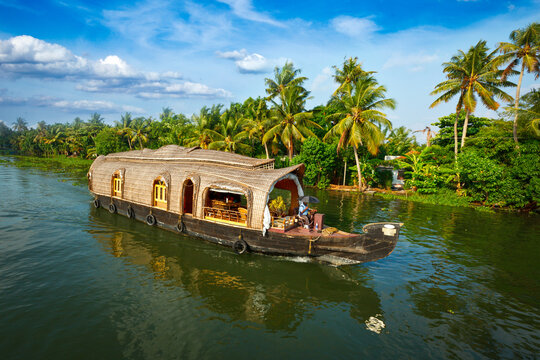 Tourism attraction of Kerala - tourist houseboat in Kerala backwaters. Kerala, India
