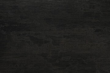 Texture of black stone surface as background, closeup