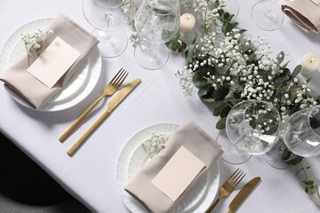 Beautiful table setting with floral decor, flat lay