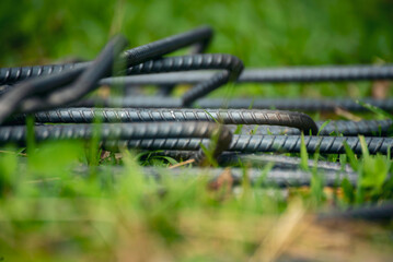 Iron wire reinforcement of concrete work. Construction site objects of bending cutting stainless steel wire fences bar. Civil construction engineering concept. pile of under construction materials