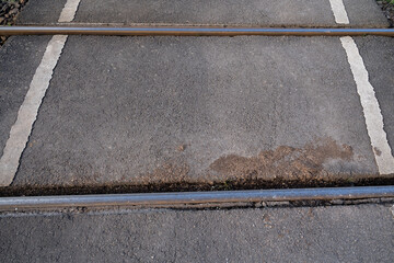 Fototapeta premium Railroad crossing on the asphalt road