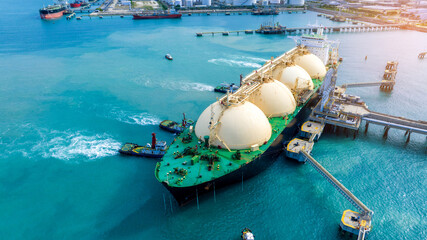LNG (Liquefied natural gas) tanker anchored in Gas terminal gas tanks for storage. Oil Crude Gas...