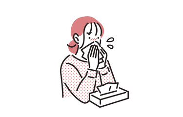 ティッシュで鼻をかむ女性