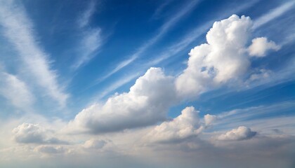 Obraz premium Skyward Serenity: Blue Background with White Clouds