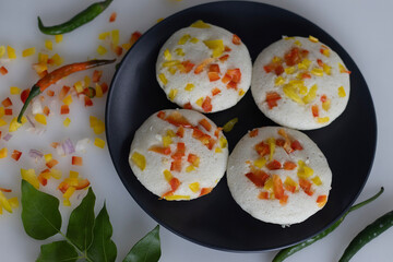 Savory bell pepper idly. A colorful and appetizing South Indian breakfast