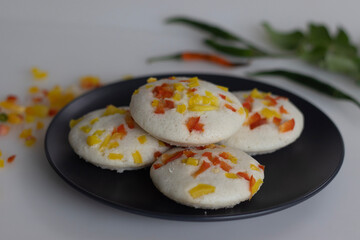Savory bell pepper idly. A colorful and appetizing South Indian breakfast