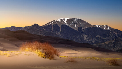 Sand Dunes in the Rocky Mountains of Colorado in the Spring. There is lots of sand. This is a...