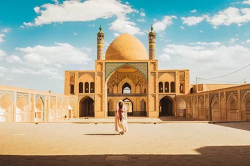 Foto op Canvas Kashan, Iran - 29th may, 2022: Tourists and pilgrims explore sightseeing beautiful Agha Bozorg Mosque © Evaldas
