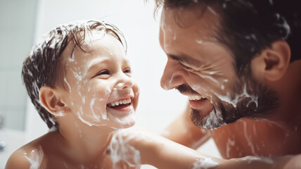 Dad and son smiling in the bathroom. Fun morning routine concept