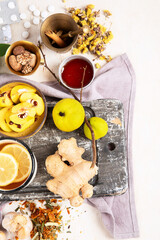 Hot drinks with honey, lemon and ginger for remedy.