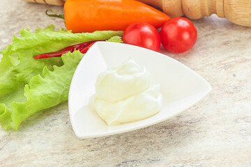 Organic mayonnaise sauce in the bowl