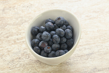 Sweet ripe blueberry heap in the bowl