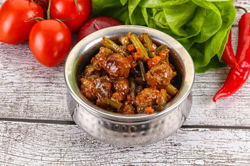 Meatball with vegetables and spices