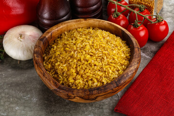 Dry wheat bulgur cereal heap