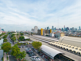 Aerial view Hua Lamphong Railway Terminal Station with skyscraper buildings Bangkok downtown skyline