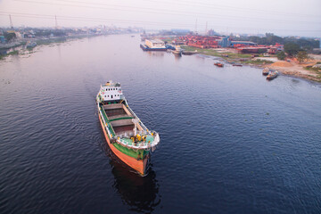 Aerial view Landscape of Sand bulkheads ships with Industrial zone in Sitalakhya River, Narayanganj, Bangladesh