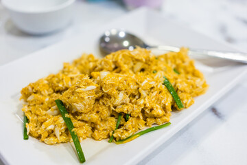 Stir fried crab with curry powder. Seafood cuisine and food travel