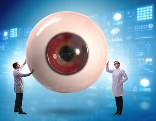 Doctor examining giant eye in medical concept