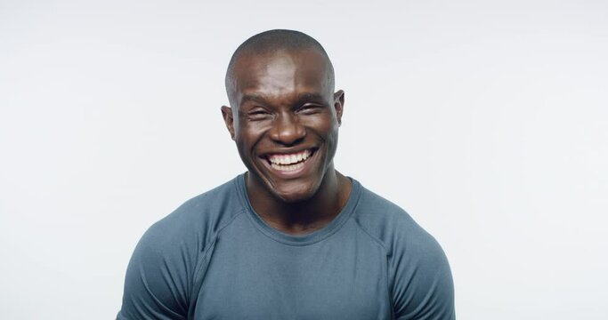 African man, fitness and laugh in studio with excited face, comic joke and training by white background. Personal trainer, funny and happy for wellness, exercise and workout with smile in portrait