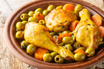 Tajine zitoun is a traditional Algerian dish made with a combination of chicken pieces, olives,...