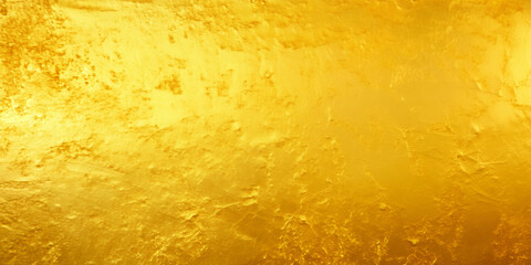 Golden background. Gold texture. Shiny golden wall texture. Beatiful luxury and elegant gold wallpaper