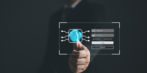 Cybersecurity and privacy concepts to protect data. Lock icon and internet network security technology. Businessman protecting personal data on finger print with virtual screen interfaces. 