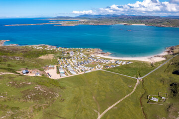 Aerial view of the camping site close to Murder Hole beach, officially called Boyeeghether Bay in County Donegal, Ireland - obrazy, fototapety, plakaty