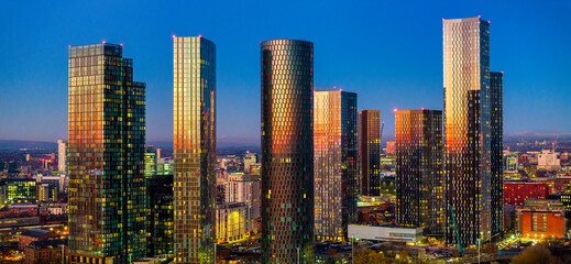 Panoramic image Manchester city skyline touched by the golden color of the twilight 
