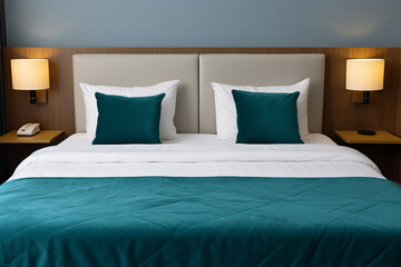 A clean and comfortable hotel accommodation room with a neat twin bed in a white and  emerald green theme. Generative AI.