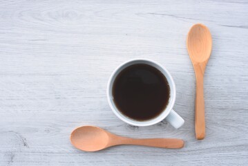 wooden spoon and cup of coffee