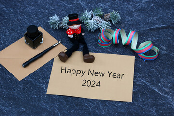Happy New Year 2024. Chimney sweep and streamers with New Year wishes.