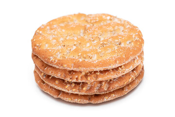 A Stack of Round Salt Crackers with Sesame Isolated on White Background. Dry Snacks - Isolation