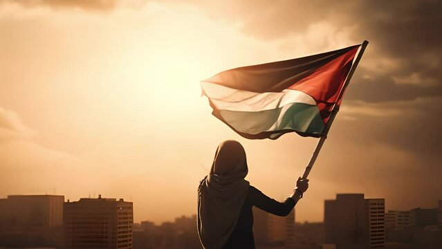 Flag waving in the wind A woman holds the Flag of Palestine, Palestinian flag in front of the city. Concept for freedom,conflict Israel and Palestine. Demonstration woman resists