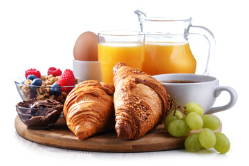 Breakfast served with coffee, juice, egg, cereals and croissants
