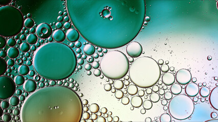 Abstract Colorful Food Oil Drops Bubbles and spheres Flowing on Water Surface