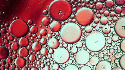 Abstract Colorful Food Oil Drops Bubbles and spheres Flowing on Water Surface