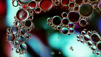 Abstract Colorful Food Oil Drops Bubbles and spheres Flowing on Water Surface - 687484738