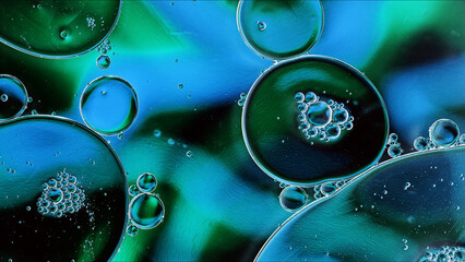 Abstract Colorful Food Oil Drops Bubbles and spheres Flowing on Water Surface - 687485166
