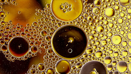 Abstract Colorful Food Oil Drops Bubbles and spheres Flowing on Water Surface - 687485183