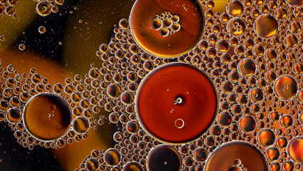 Abstract Colorful Food Oil Drops Bubbles and spheres Flowing on Water Surface - 687485189