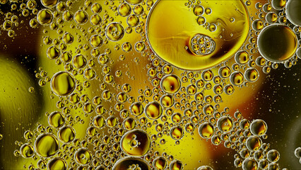 Abstract Colorful Food Oil Drops Bubbles and spheres Flowing on Water Surface - 687485190