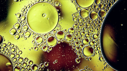 Abstract Colorful Food Oil Drops Bubbles and spheres Flowing on Water Surface - 687485351