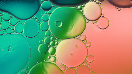 Abstract Colorful Food Oil Drops Bubbles and spheres Flowing on Water Surface - 687485577