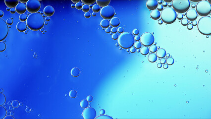 Abstract Colorful Food Oil Drops Bubbles and spheres Flowing on Water Surface - 687485579