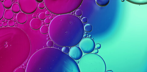 Abstract Colorful Food Oil Drops Bubbles and spheres Flowing on Water Surface - 687485580