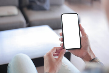 cell phone blank white screen mockup.hand holding texting using mobile on desk at office.background empty space for advertise.work people contact marketing business,technology