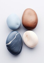 Composition with pebbles in pastel tones